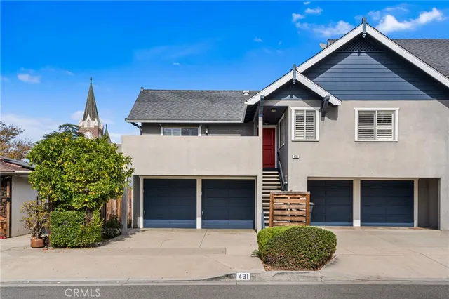 a front view of a house with a garage