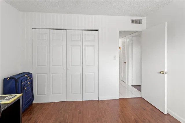 a view of room with hardwood floor