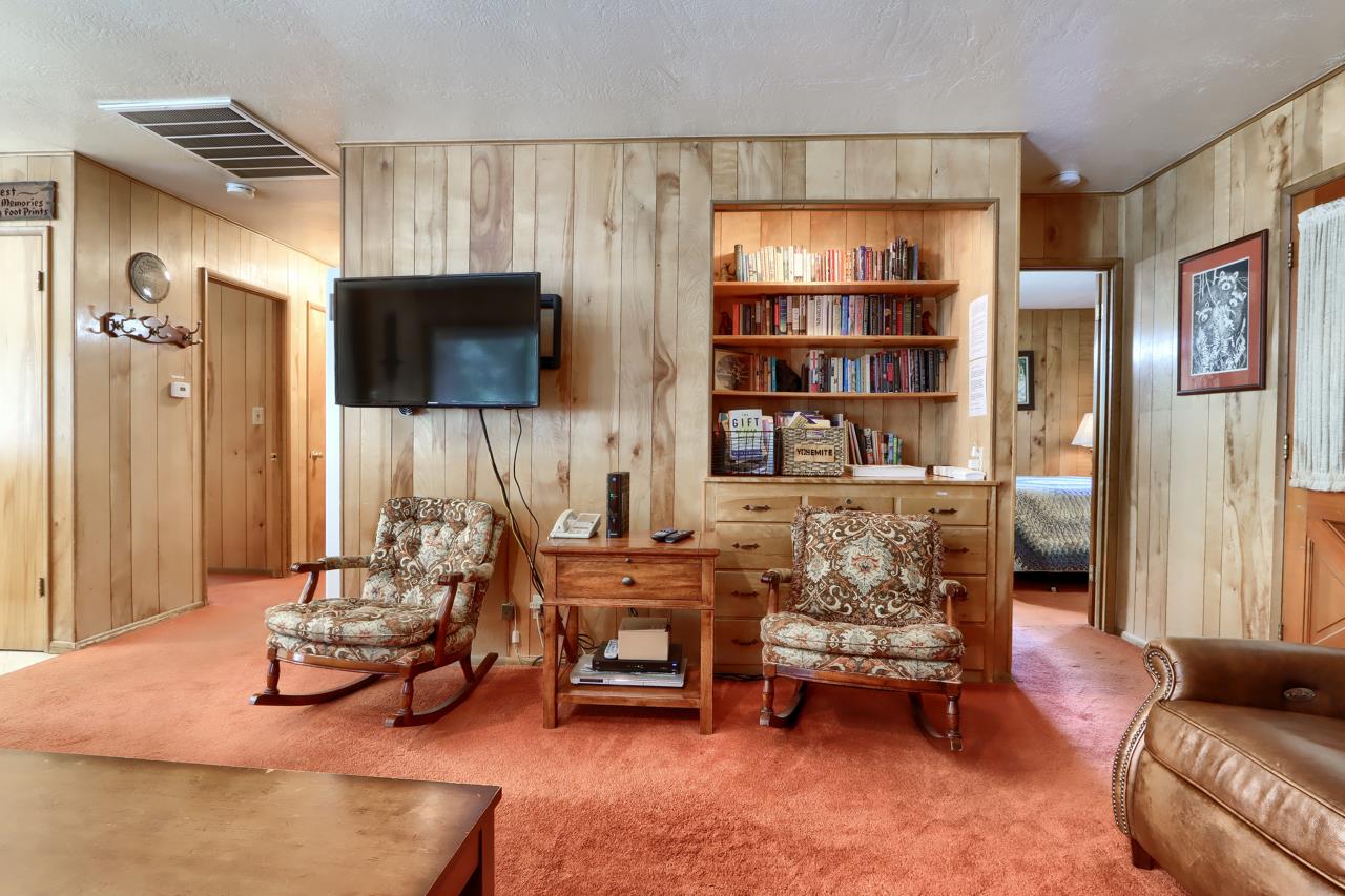 2580 River Road Wawona, CA 95389 - Photo 4 of 5 a living room with furniture and a flat screen tv