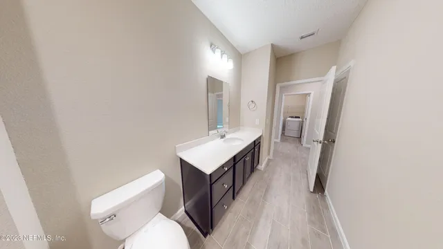 a view of a storage & utility room with washer and dryer