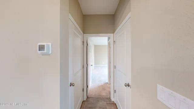 a view of a room with racks on the wall