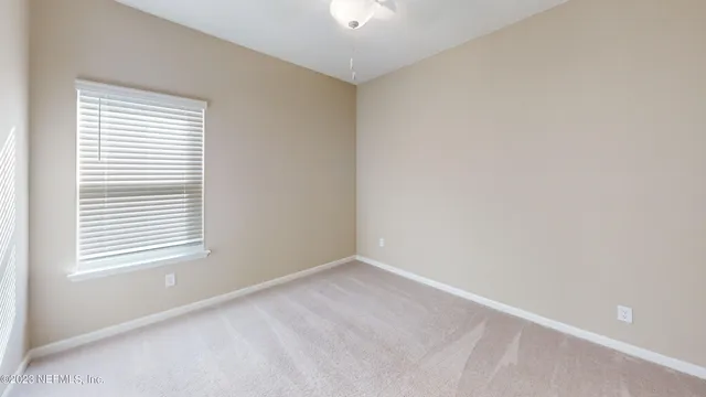 a view of a hallway with closet area