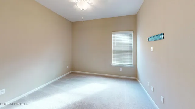 an empty room with a natural light