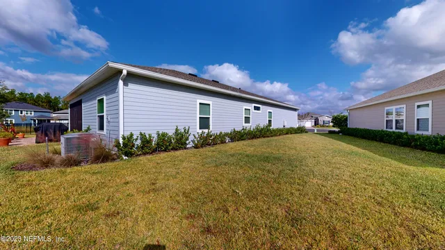 a view of swimming pool of the house with outdoor seating