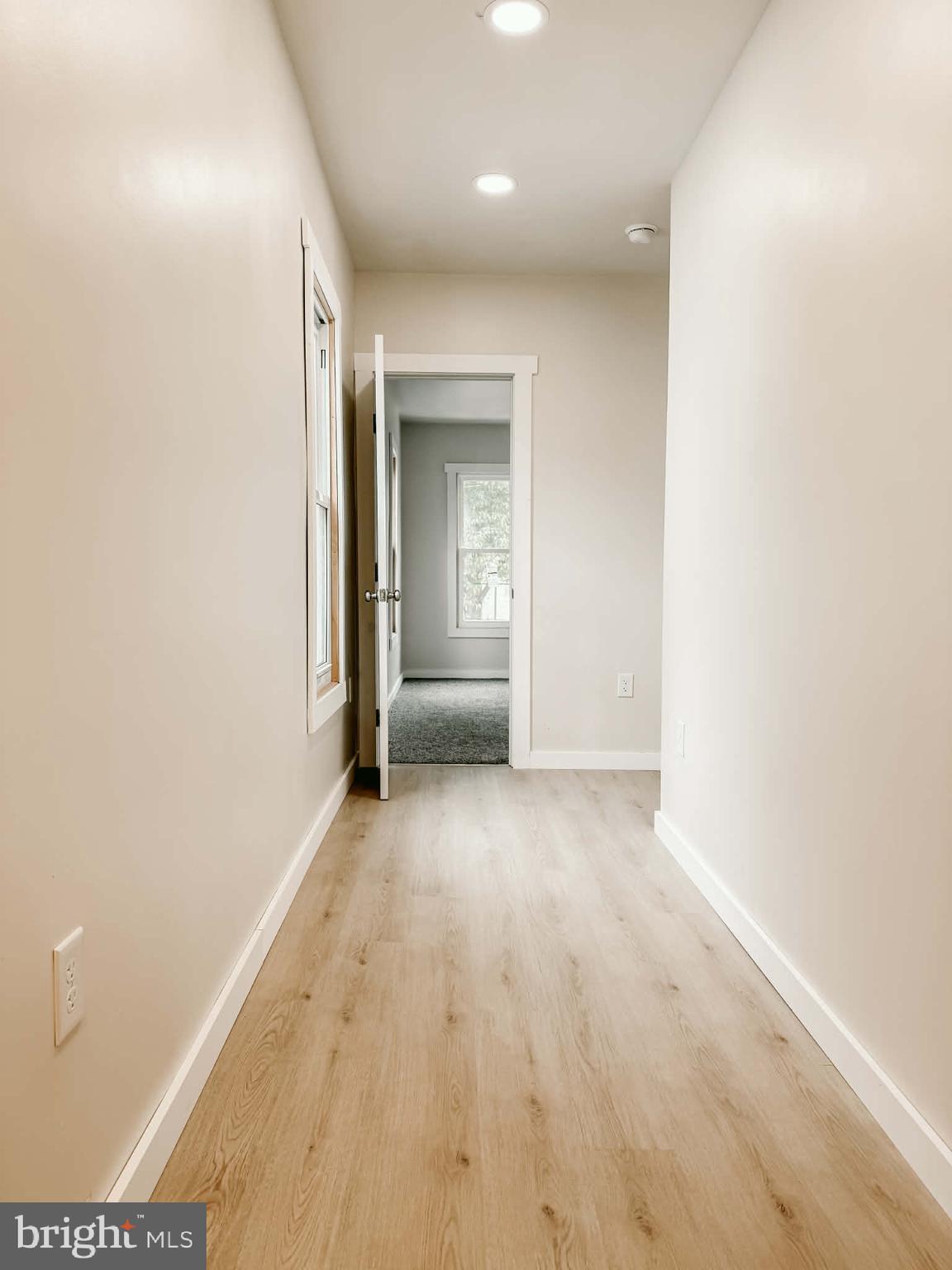 119 South Walnut Street Lewistown, PA 17044 - Photo 12 of 29 wooden floor in a hall with a window