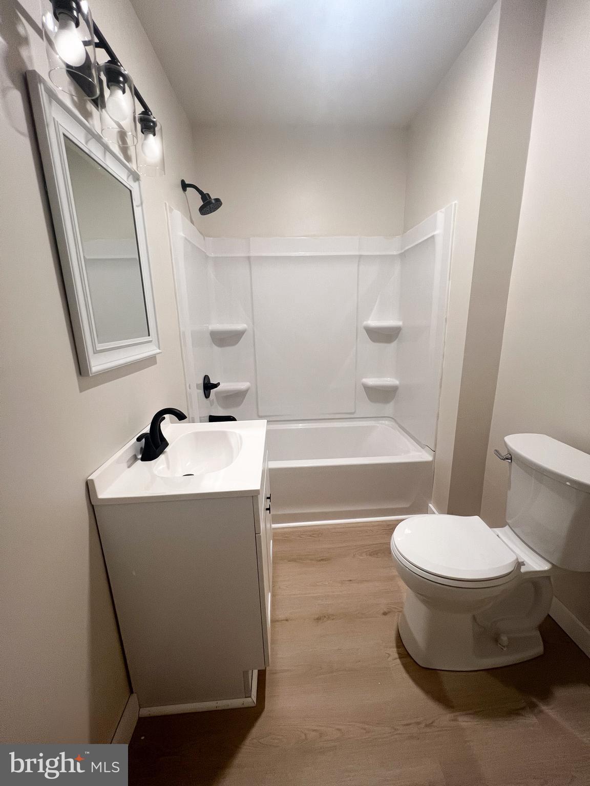 119 South Walnut Street Lewistown, PA 17044 - Photo 19 of 29 a bathroom with a sink toilet and shower