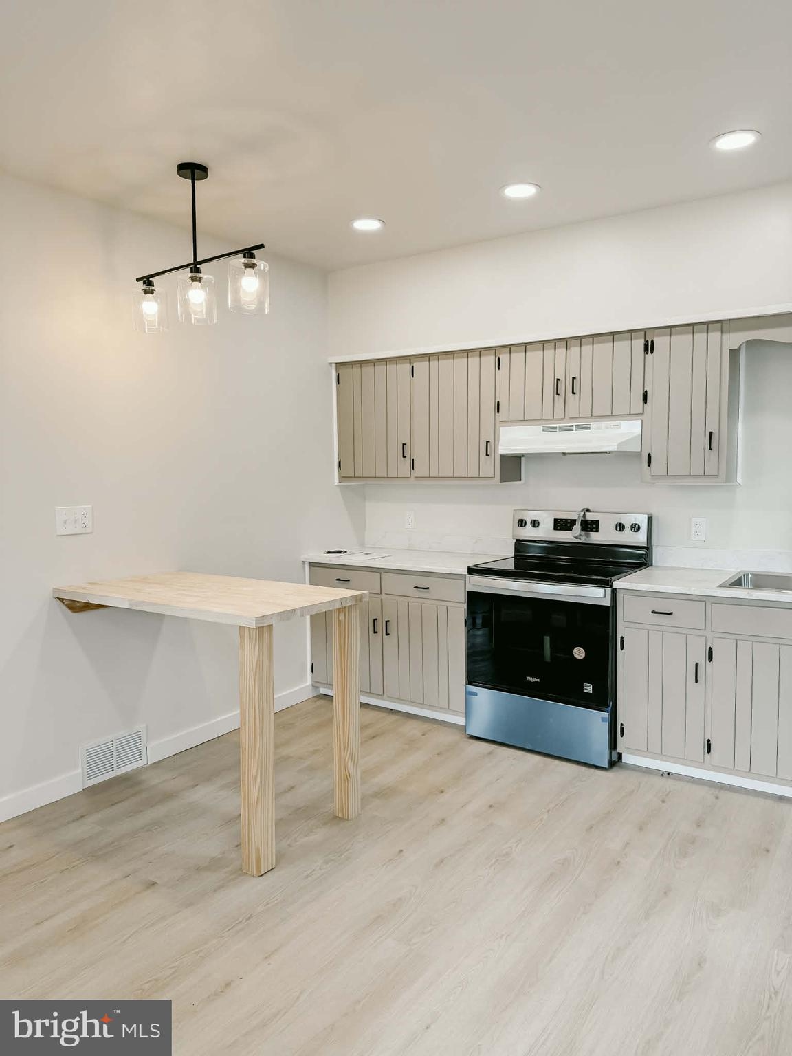 119 South Walnut Street Lewistown, PA 17044 - Photo 4 of 29 a kitchen with stainless steel appliances a stove refrigerator and cabinets