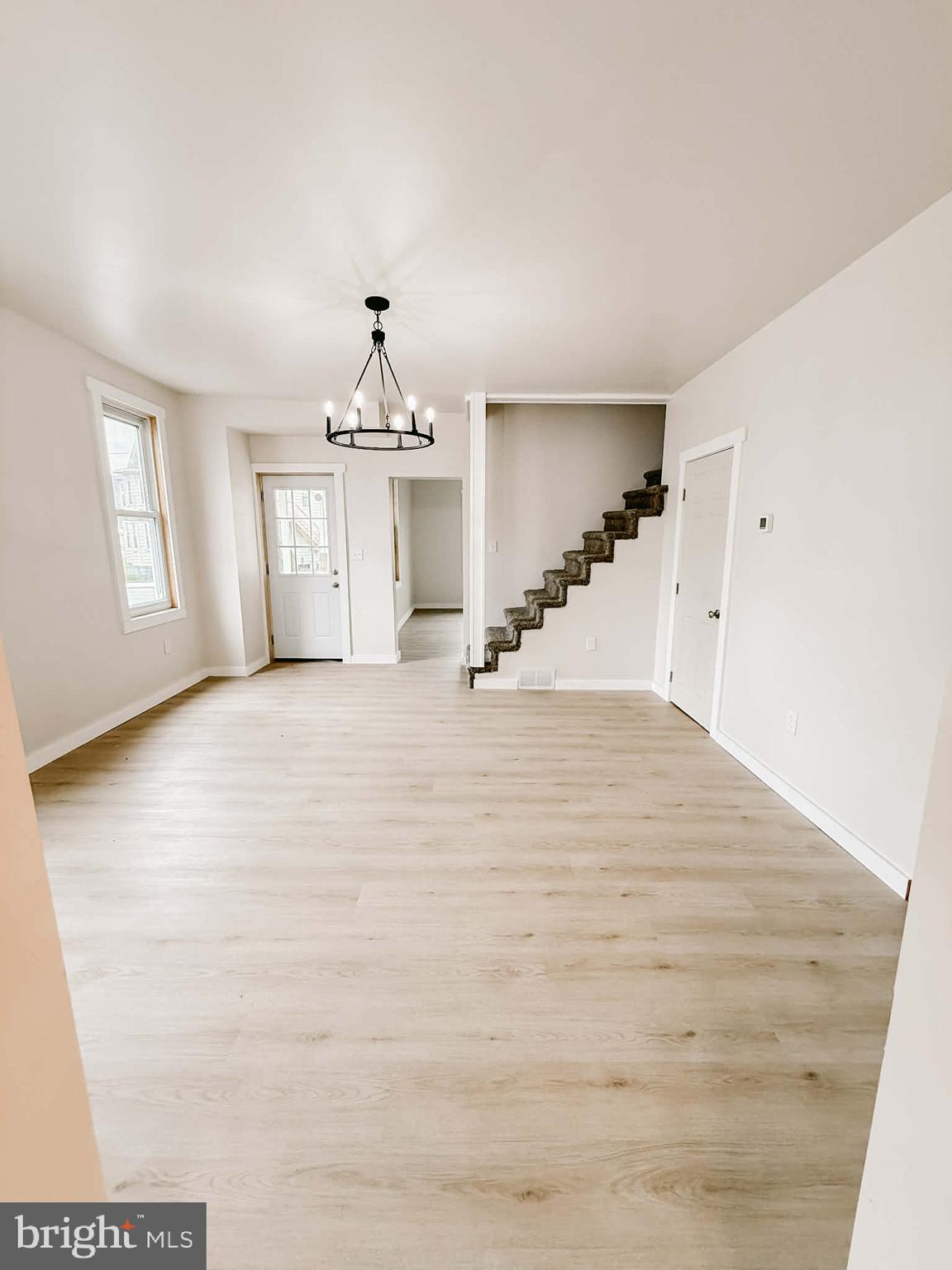 119 South Walnut Street Lewistown, PA 17044 - Photo 6 of 29 a view of a livingroom with a chandelier