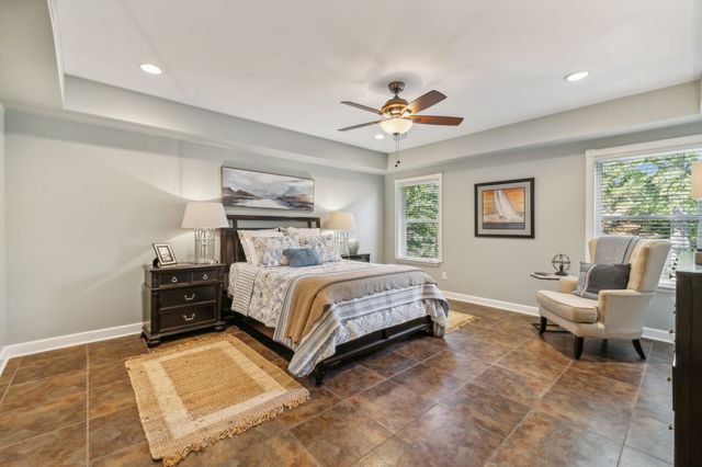 a bed room with a bed and a couch