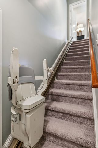 a backyard of a house with large trees