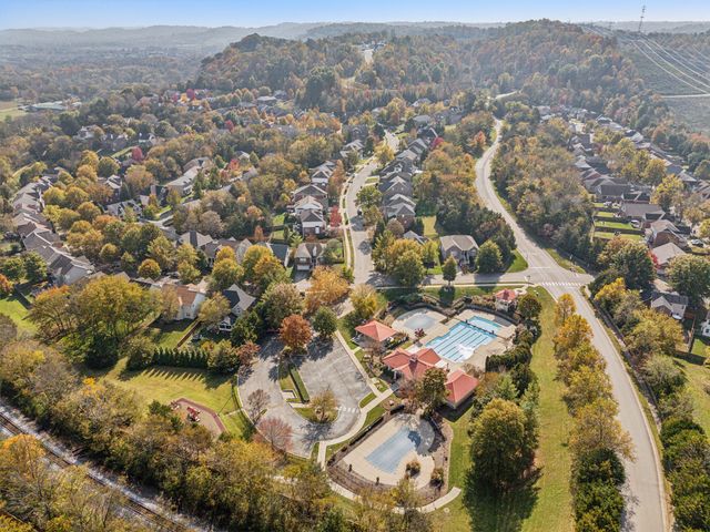 a view of an outdoor space with swimming pool