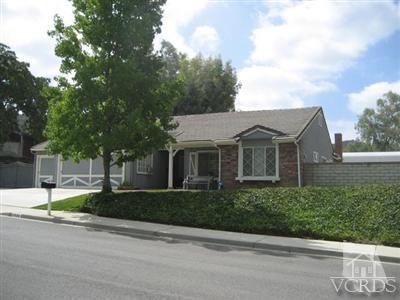 1924 Rambling Road Simi Valley, CA 93065 - Photo 1 of 30 a view of a white house with a street