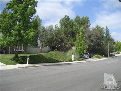 1924 Rambling Road Simi Valley, CA 93065 - Photo 7 of 30 a view of a street with a house in the background