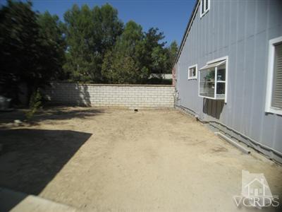 1924 Rambling Road Simi Valley, CA 93065 - Photo 9 of 30 a view of a house with backyard and trees