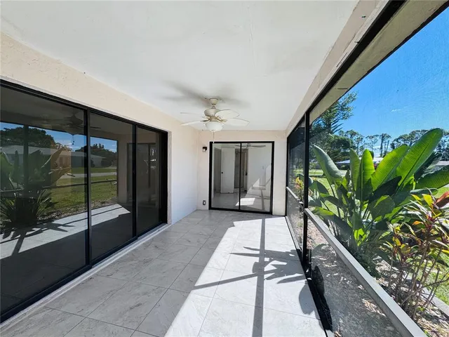 a house with a plant in front of it
