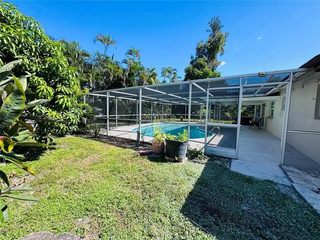 a view of a golf course with a lake