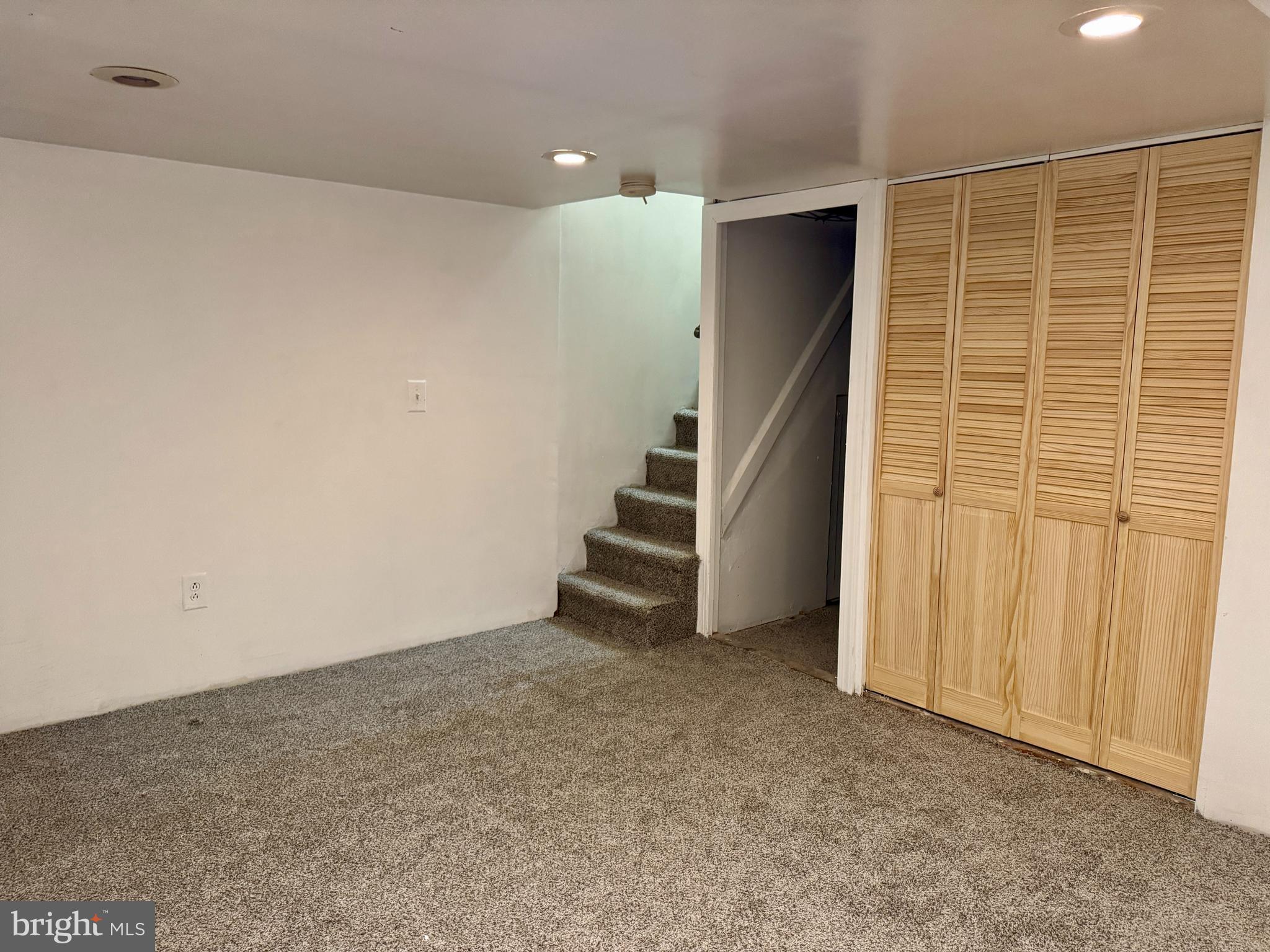 318 West Godfrey Avenue Philadelphia, PA 19120 - Photo 21 of 25 a view of an empty room with stairs