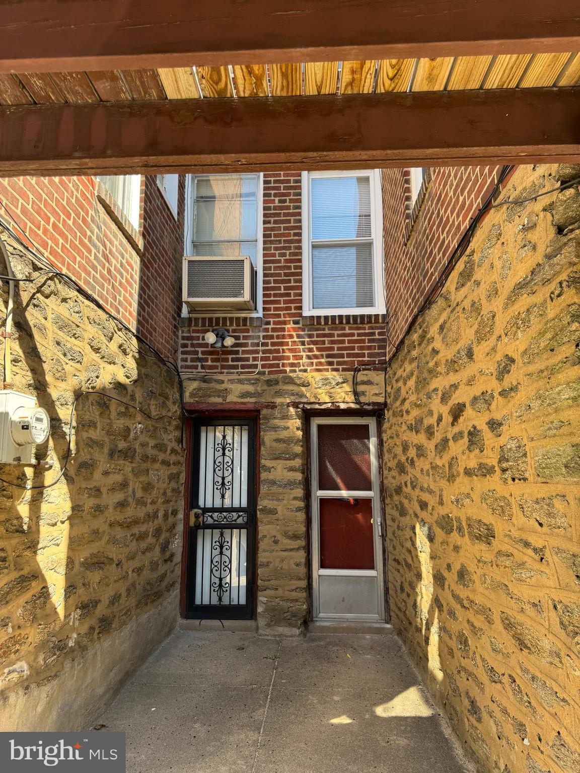 318 West Godfrey Avenue Philadelphia, PA 19120 - Photo 25 of 25 a front view of a building with glass door