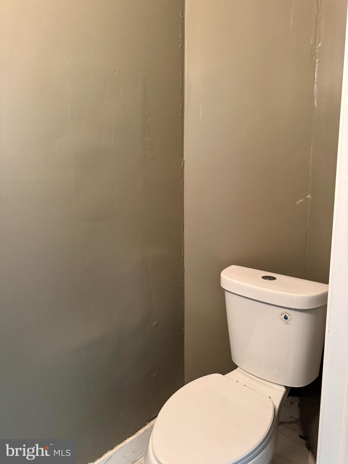 318 West Godfrey Avenue Philadelphia, PA 19120 - Photo 9 of 25 a white toilet sitting next to a white wall