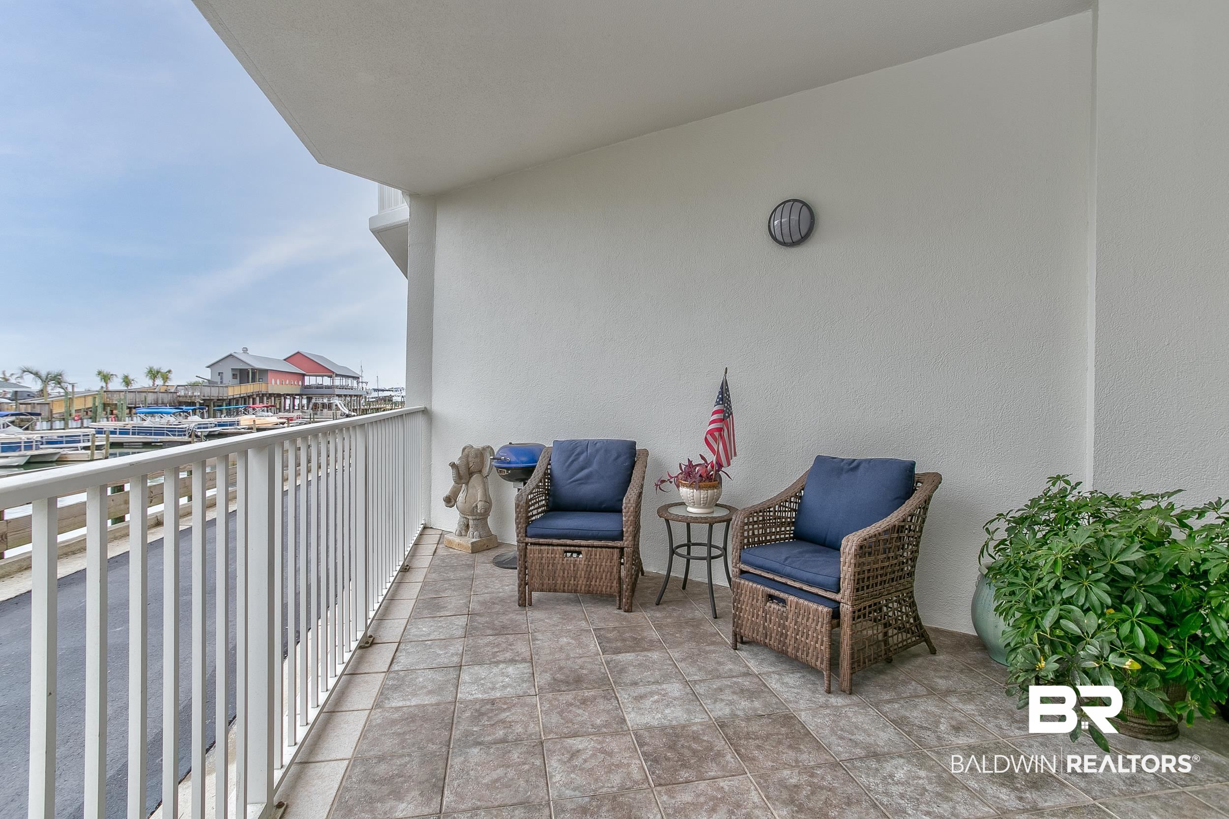 27282 Canal Road, Unit 101 Orange Beach, AL 36561 - Photo 29 of 49 Patio with Water Views