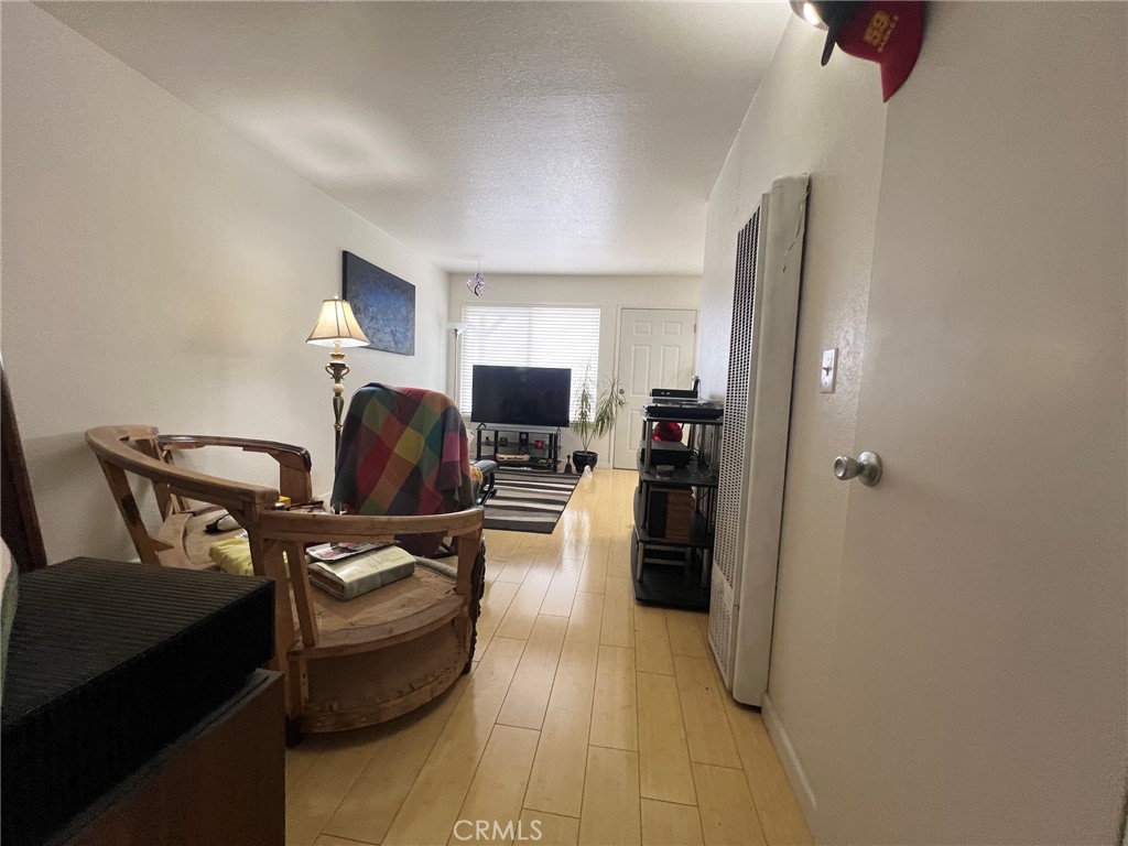 375 Surf Street Morro Bay, CA 93442 - Photo 15 of 25 a living room with furniture and a flat screen tv