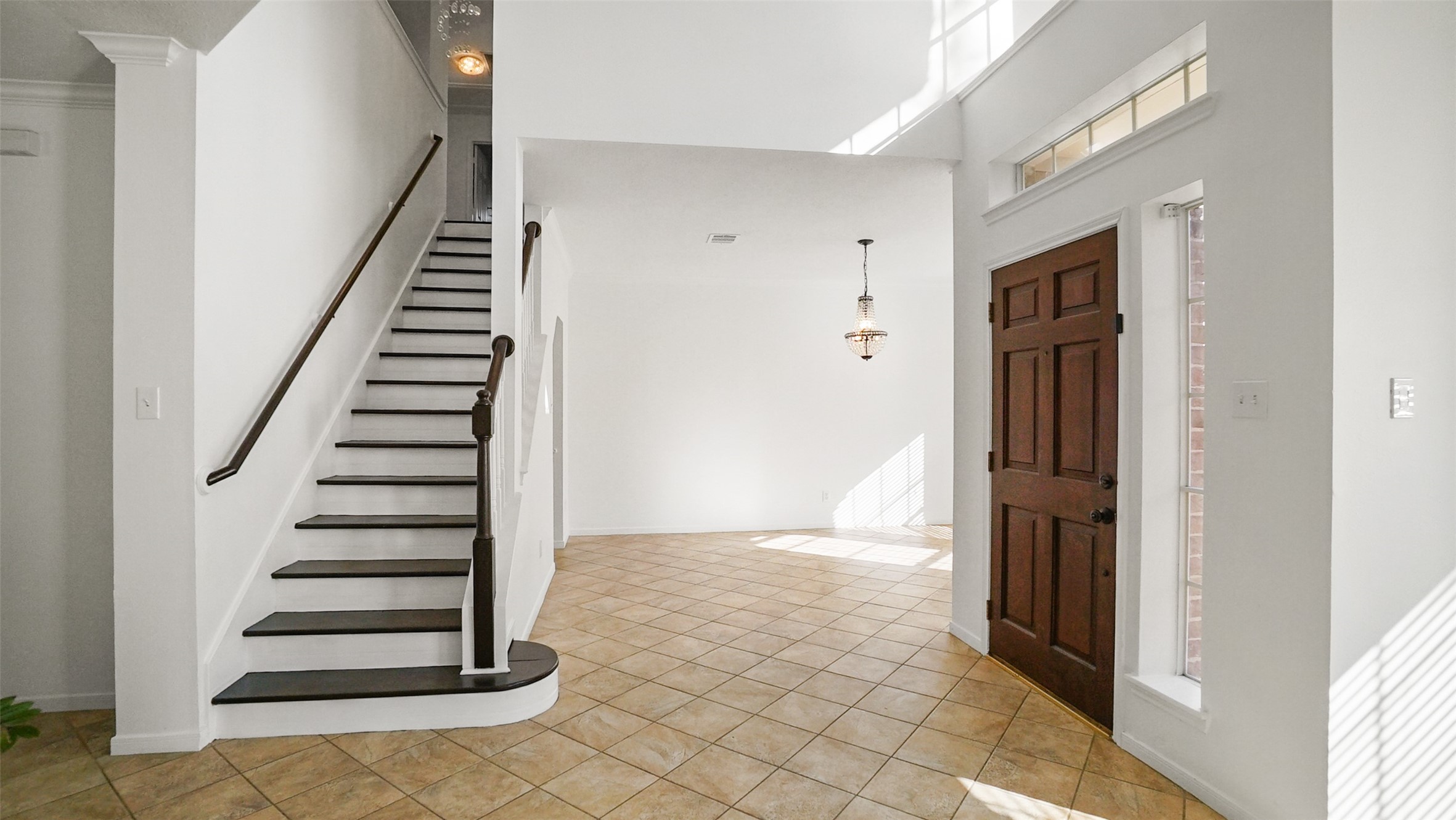 810 Flanners Court Spring, TX 77373 - Photo 7 of 46 a view of a hallway with windows and stairs