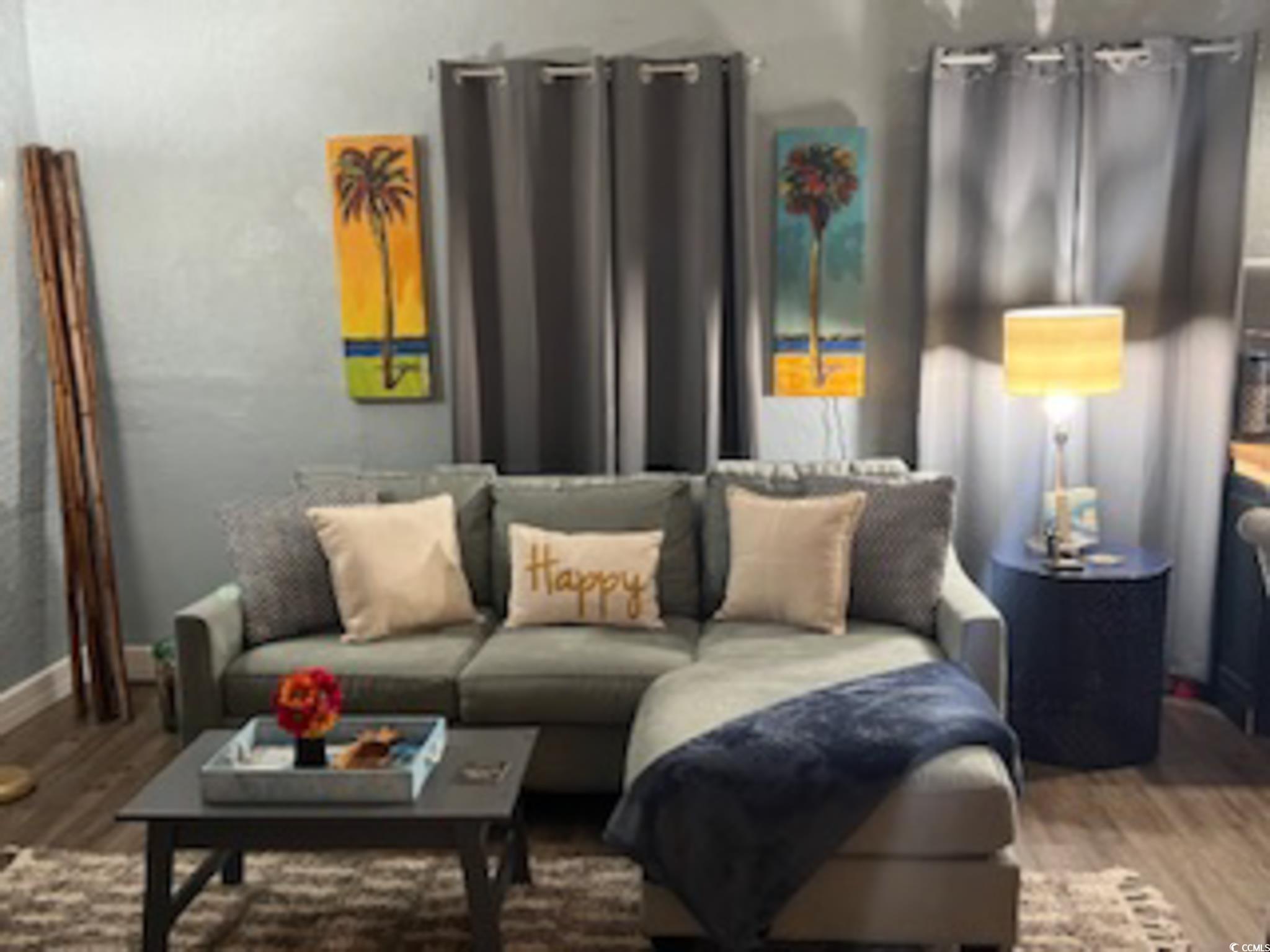 5588 Daybreak Road, Unit GUEST HOUSE Murrells Inlet, SC 29576 - Photo 8 of 18 Living room with dark wood-style flooring