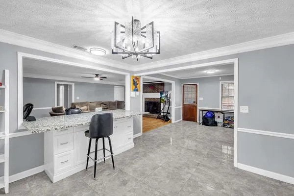 a view of kitchen and living room