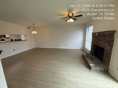 a view of a livingroom with a fireplace