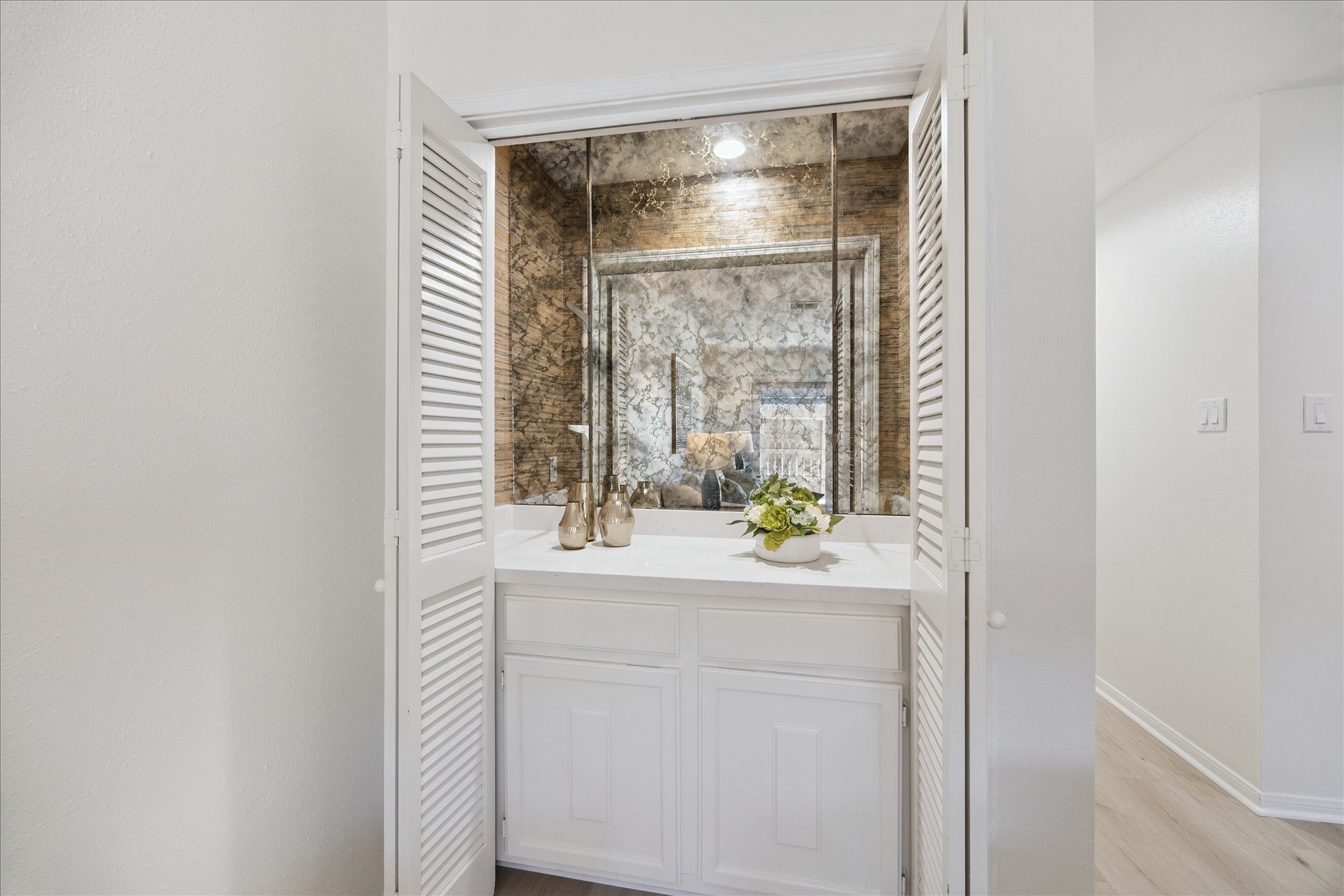 2515 Bering Drive, Unit 11 Houston, TX 77057 - Photo 10 of 26 a bathroom with a shower sink and mirror