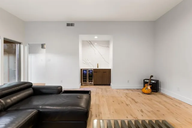 a bedroom with bed and window