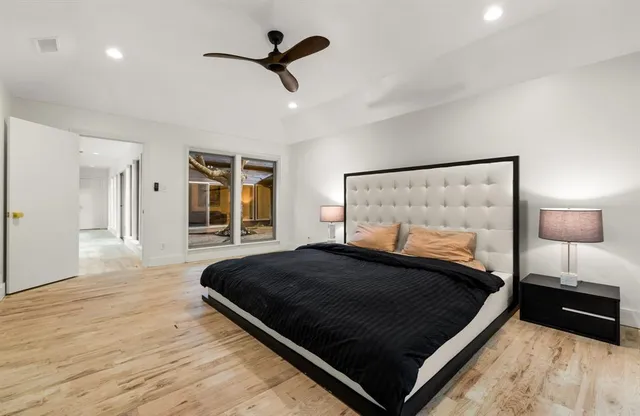 a bedroom with a bed and a walk in closet