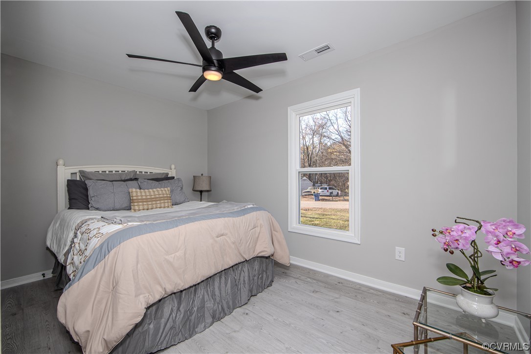 4629 Twelveoaks Road Midlothian, VA 23112 - Photo 14 of 23 a bedroom with a bed and a window