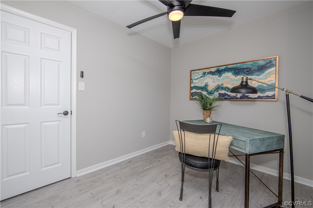 4629 Twelveoaks Road Midlothian, VA 23112 - Photo 16 of 23 a view of a dining room with furniture and wooden floor