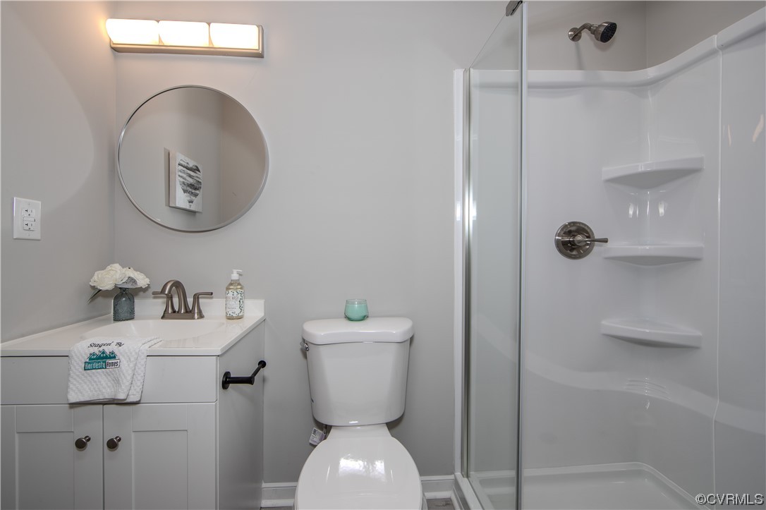 4629 Twelveoaks Road Midlothian, VA 23112 - Photo 17 of 23 a bathroom with a toilet sink and shower
