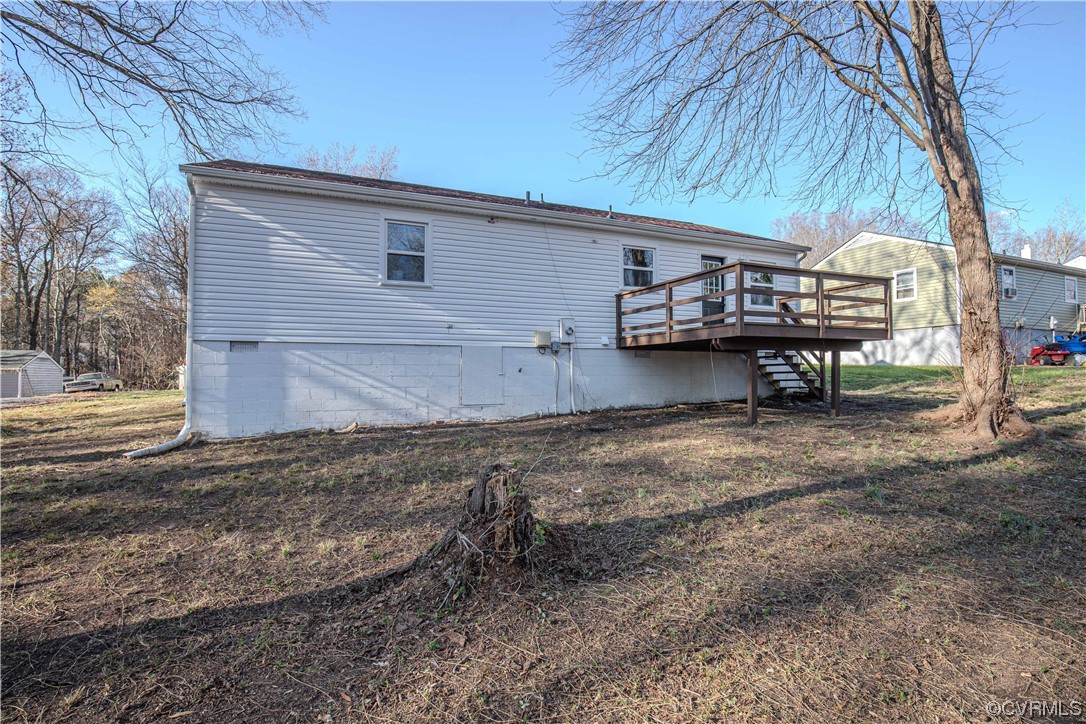 4629 Twelveoaks Road Midlothian, VA 23112 - Photo 20 of 23 a backyard of a house with table and chairs
