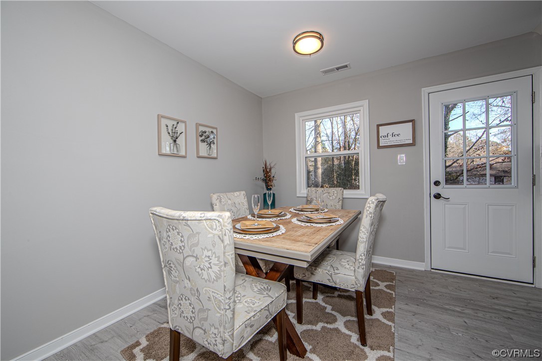 4629 Twelveoaks Road Midlothian, VA 23112 - Photo 5 of 23 a view of a dining room with furniture and wooden floor
