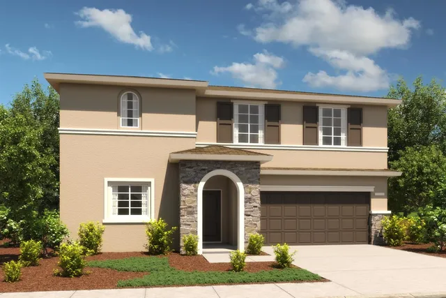 a front view of a house with yard