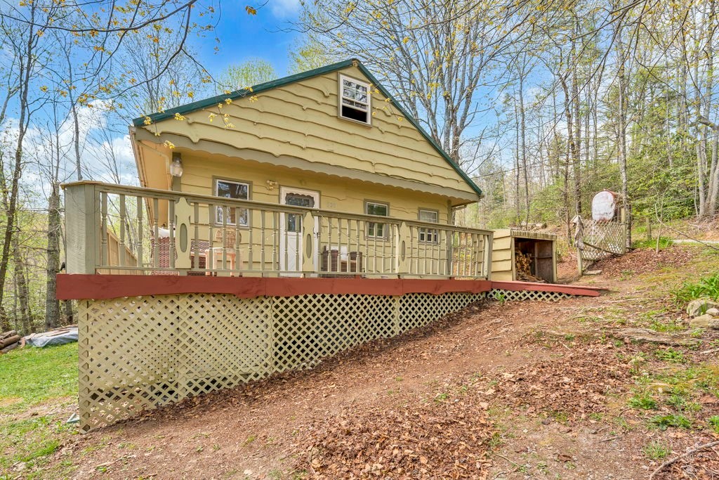 179 Soave Ridge Deep Gap, NC 28618 - Photo 3 of 31 a front view of a house with a yard