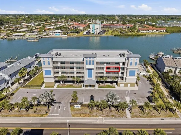 an aerial view of a building with outdoor space