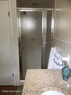 a bathroom with a mirror