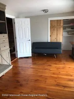 a view of a living room and balcony