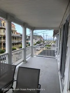 a balcony with furniture and outdoor view