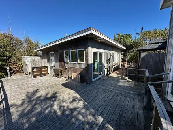 a backyard of a house with seating space
