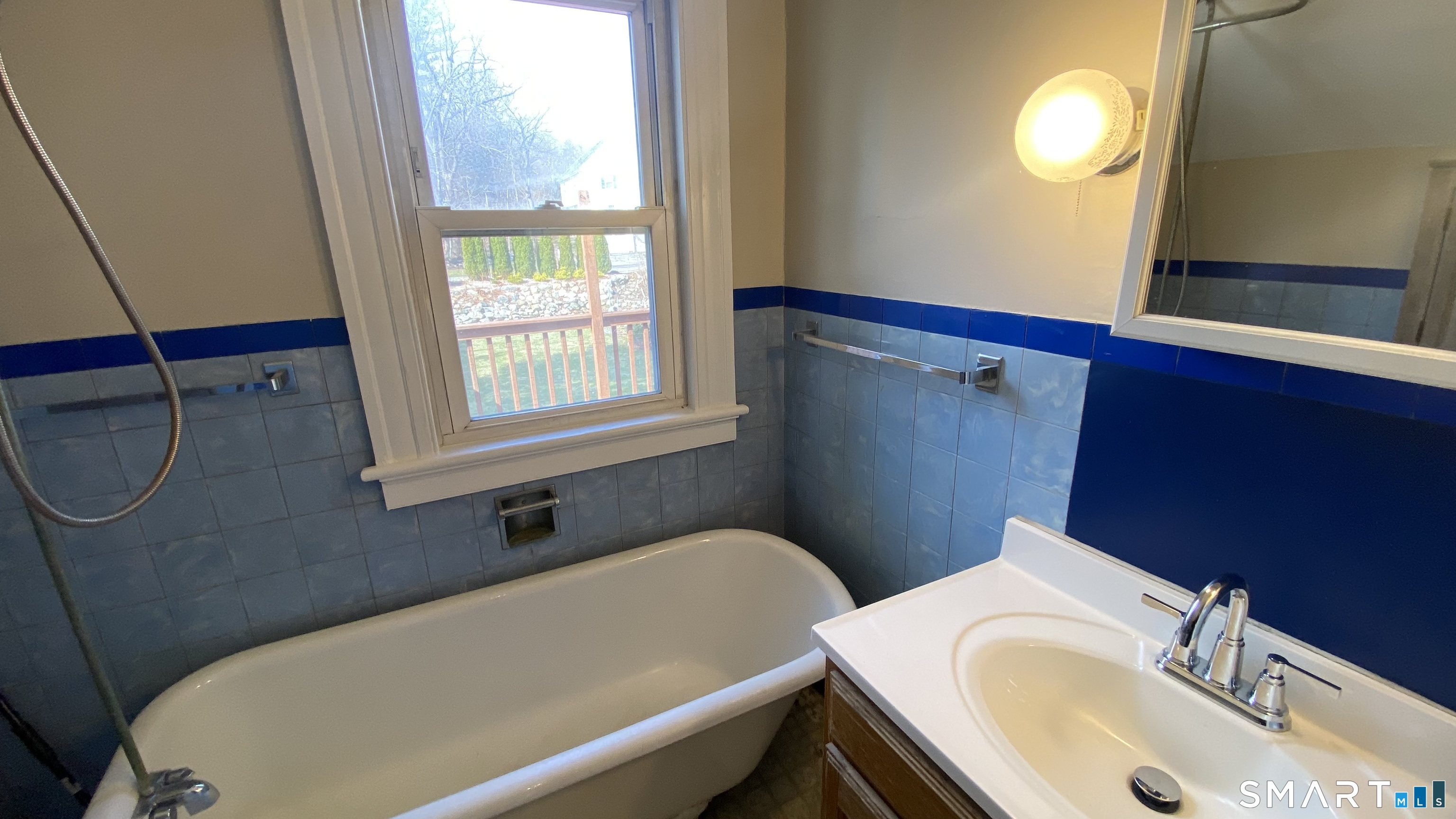 88 Belleview Avenue Torrington, CT 06790 - Photo 19 of 26 a bathroom with a sink and a toilet