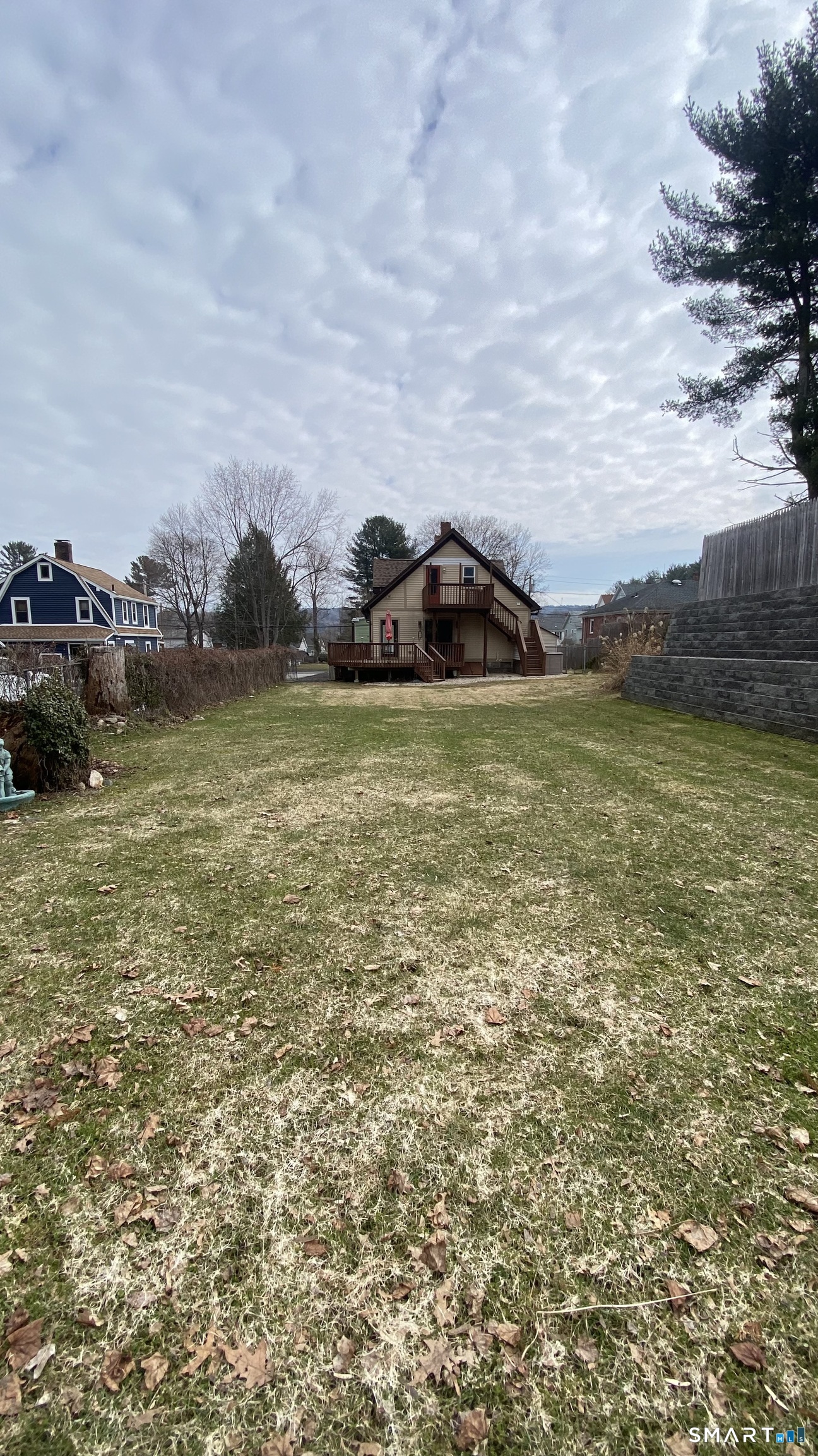 88 Belleview Avenue Torrington, CT 06790 - Photo 25 of 26 a view of a lake with houses in the back