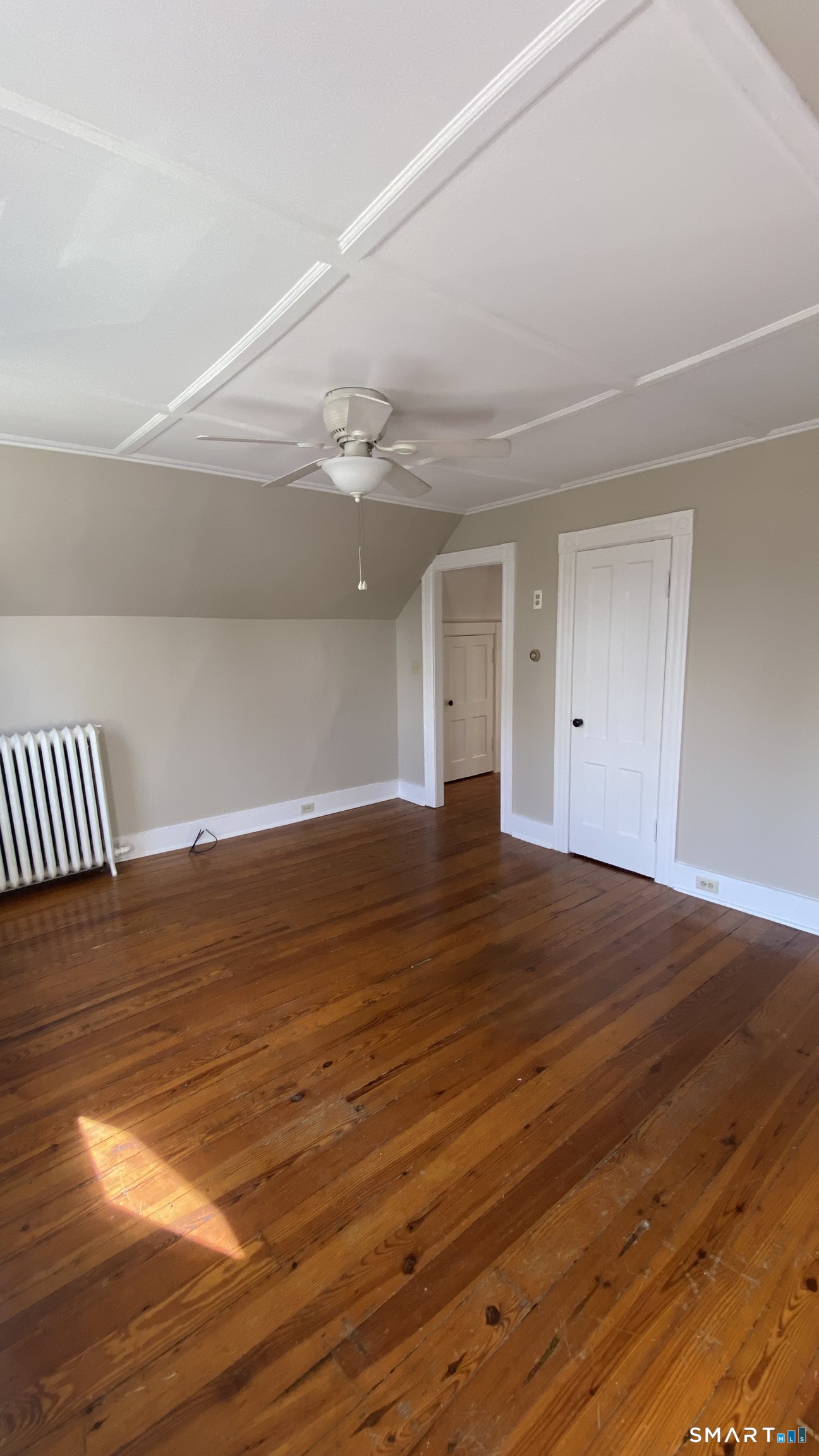 88 Belleview Avenue Torrington, CT 06790 - Photo 10 of 26 a view of empty room with wooden floor
