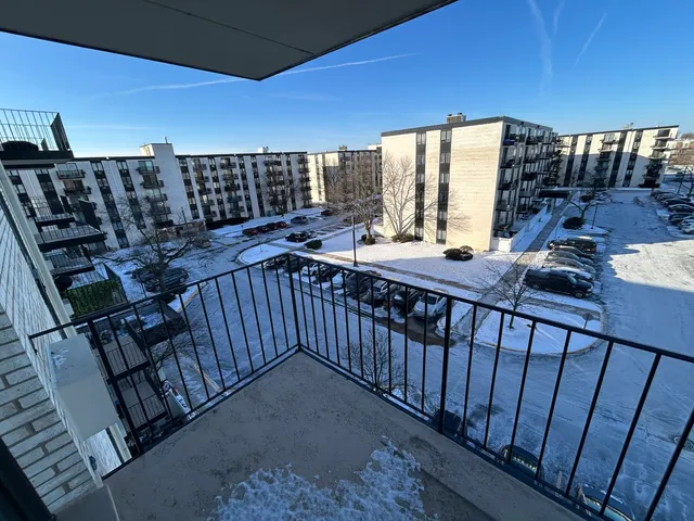 a view of a balcony with an outdoor space