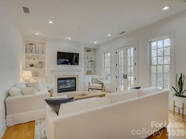 a living room with furniture and a couch