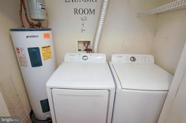 a utility room with dryer and washer